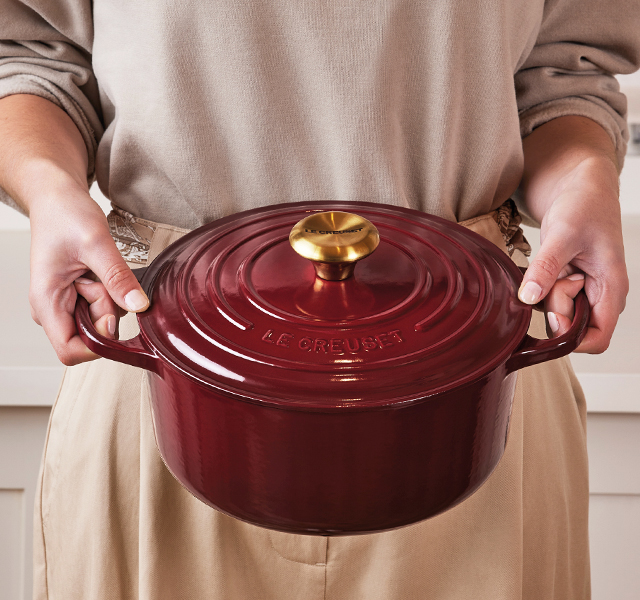 assorted cookare items in wine red