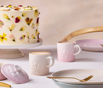 Cappuccino in a mug with floral reliefs