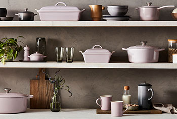 assorted cookware including shallot and oyster on shelves