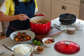 preparing curry on stovetop