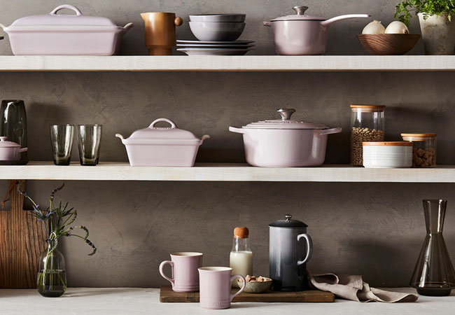 soft pink mixed with gray cookware on shelves