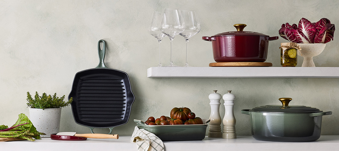 thyme, meringue white and rhone red cookware on a shelf