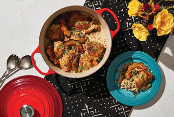 browned chicken in a dutch oven