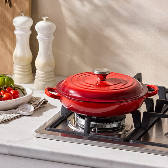 large set of cerise red cookware