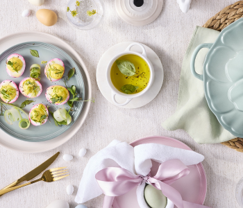 Stoneware dinner plates on an Easter-themed table 