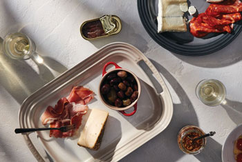 serving platter with cheese and charcuterie