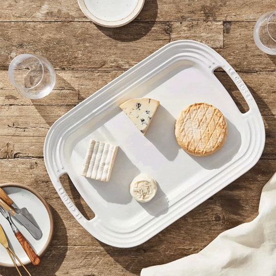 cheese on a white serving platter