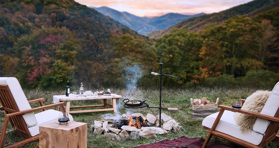 alpine collection cookware being used to cook over an open campfire