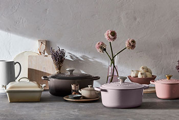 assorted cookware in soft colors