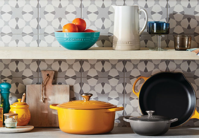 turquoise and yellow cookware on shelves