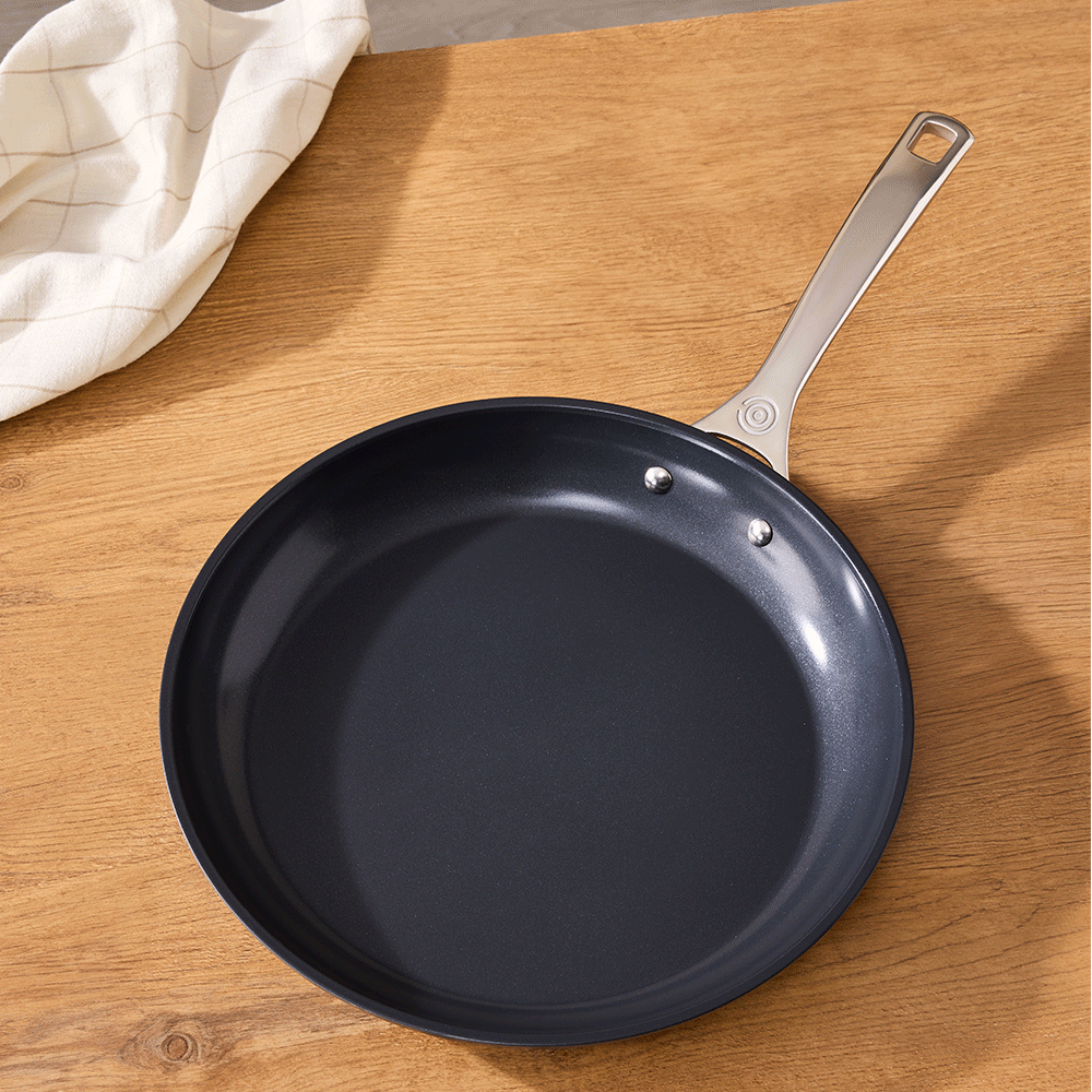 soap suds on a piece of cookware