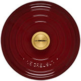 Garnet red wine colored lid with gold knob