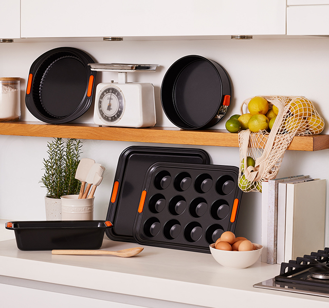 utensils hanging on a peg board