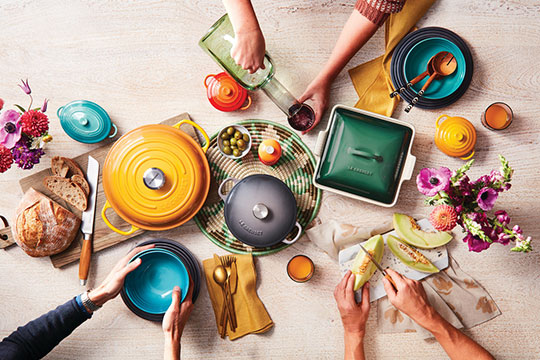 colorful cookware arranged on a table