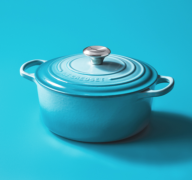 caribbean cookware with reds and yellows