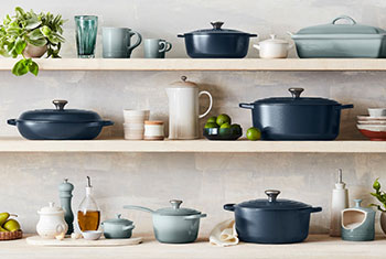 navy, meringue and sea salt cookware on shelves