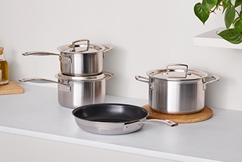 various cookware items and accessories in Cerise red