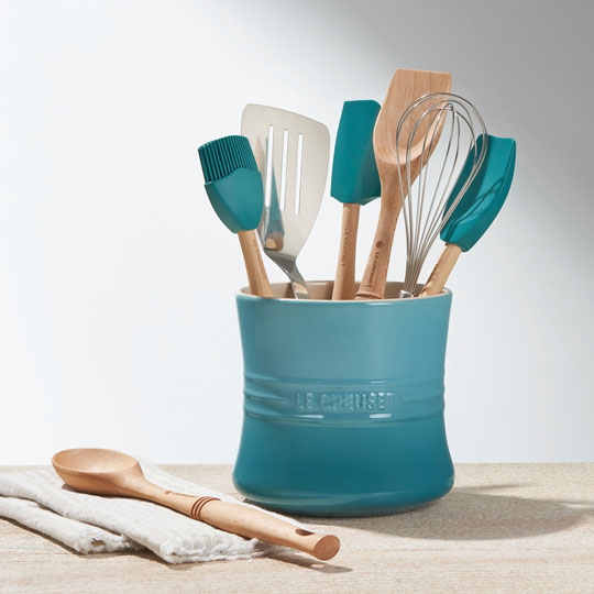 caribbean blue utensil crock filled with assorted tools