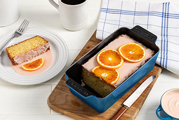 loaf pan dessert topped with sliced oranges