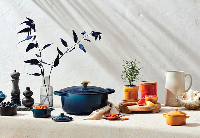 off white cookware with bold blue-green agave