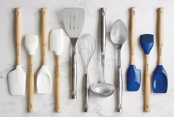 an array of le creuset utensils
