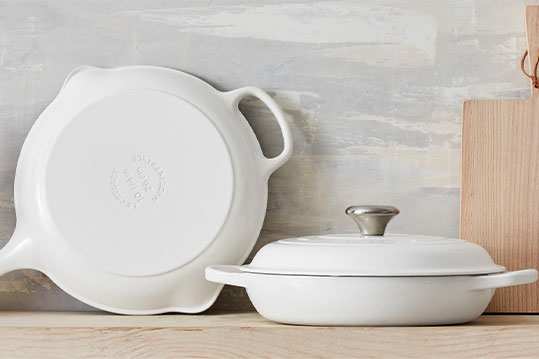 links to a page about the story of Le Creuset